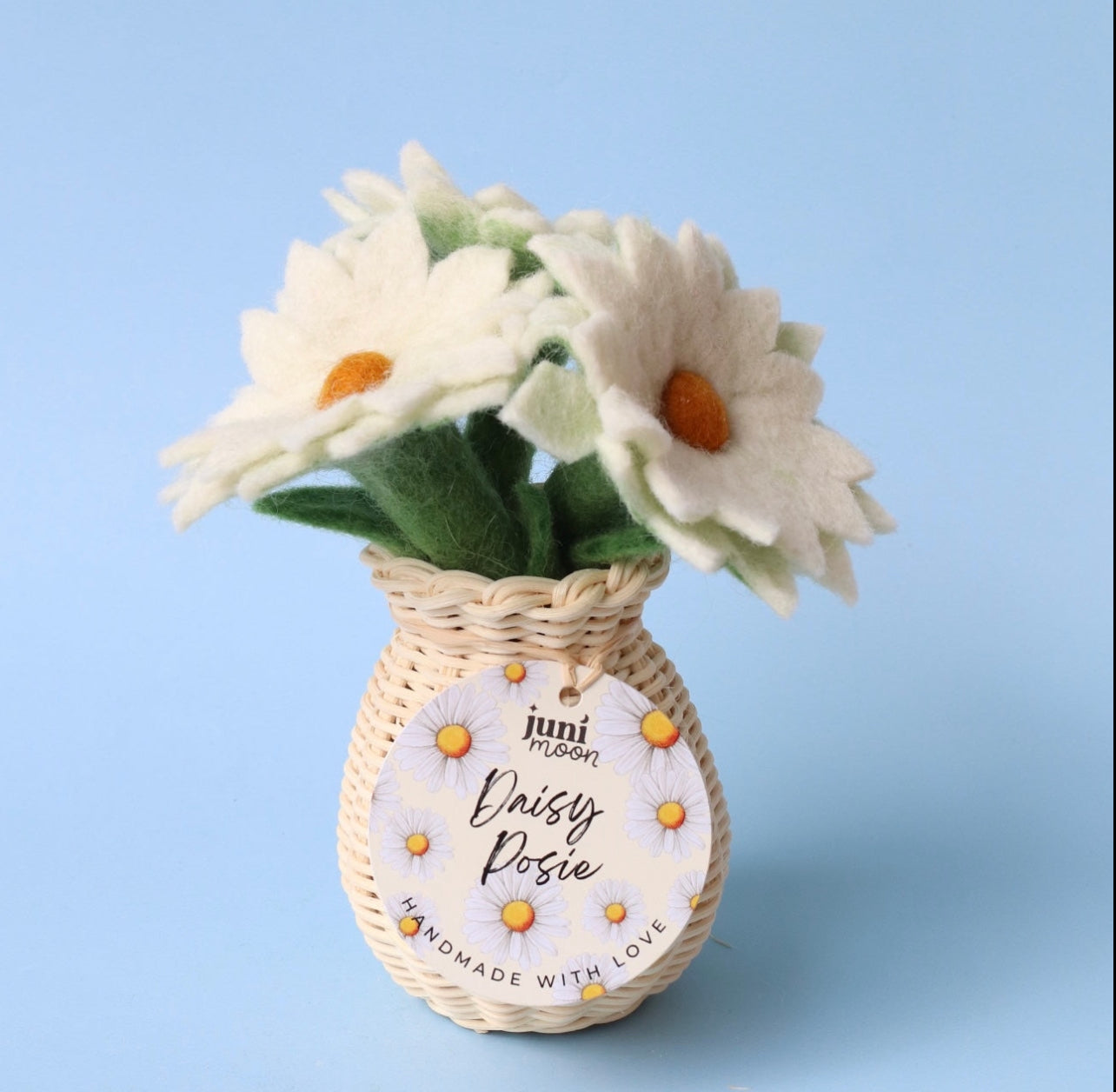 Daisy posies with rattan vase