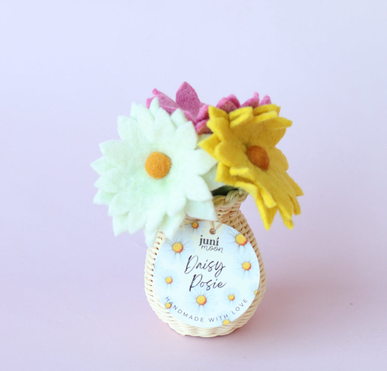 Daisy posies with rattan vase